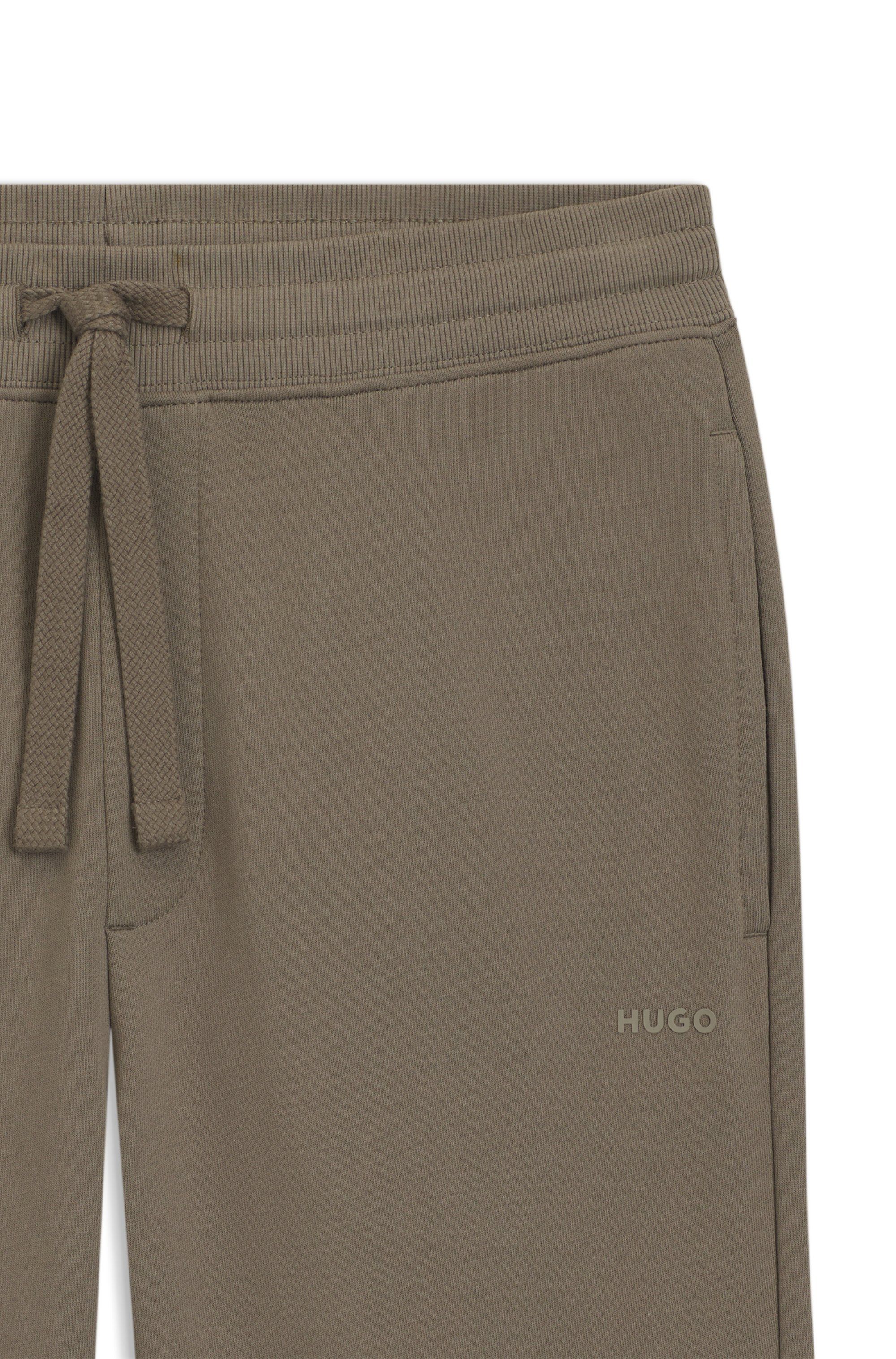 Teplákové kalhoty s manžetami z bavlněného froté s potiskem loga - Medium Grey