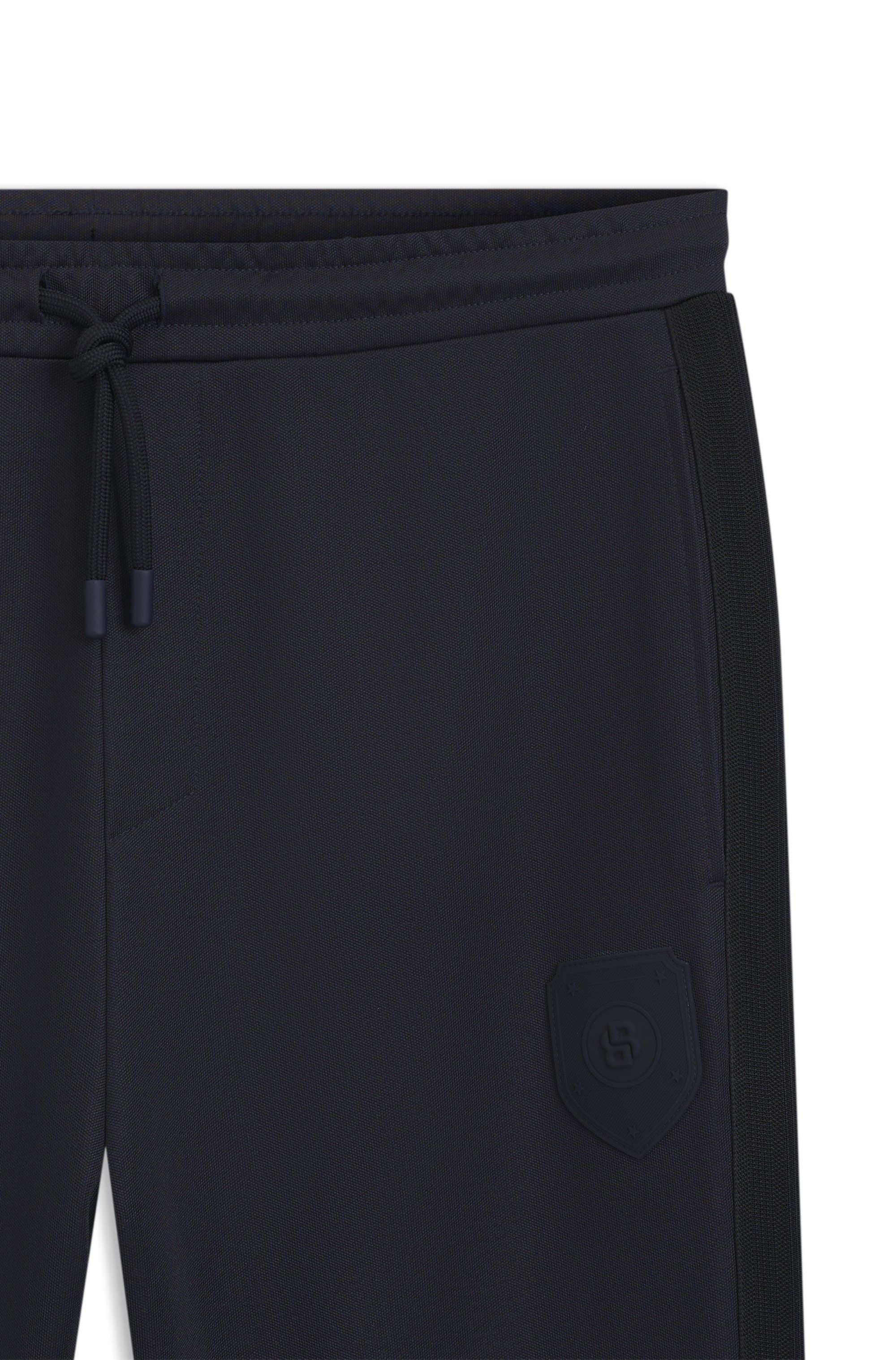 Teplákové kalhoty regular střihu s logem erbu - Dark Blue